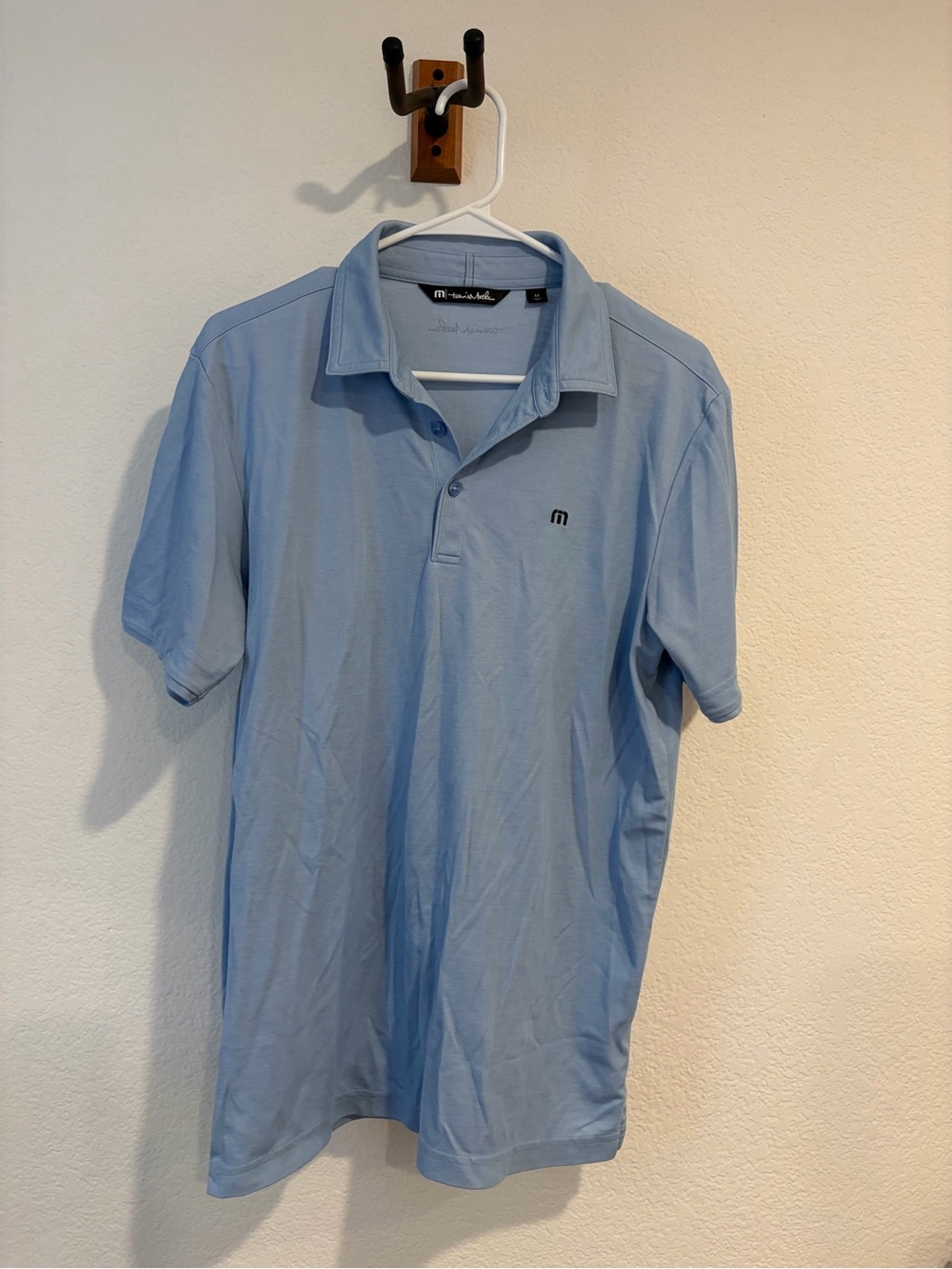 TravisMathew Light Blue Men's Polo with Subtle Logo
